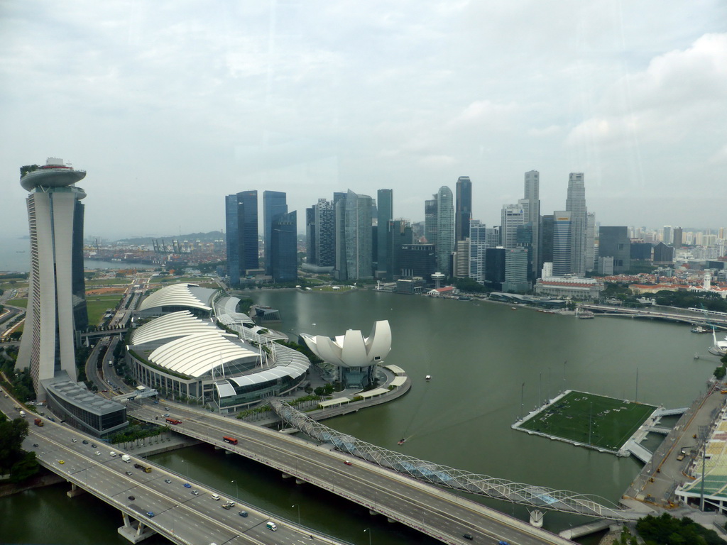 The Marina bay, the Marina Bay Sands building, the ArtScience Museum, the Float at Marina Bay stadium and skyscrapers at the Central Business District, viewed from the Singapore Flyer ferris wheel