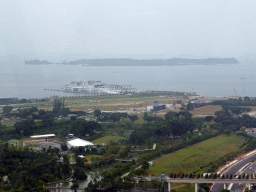 The Marina Bay Cruise Centre, the Singapore Strait and St. John`s Island, viewed from the Singapore Flyer ferris wheel