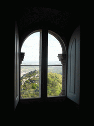 Window at the upper floor of the Palácio da Pena palace, with a view on the Castelo dos Mouros castle