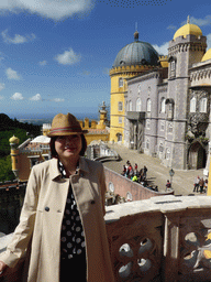 Miaomiao at the Queen`s Terrace, with a view on the southeast side of the Palácio da Pena palace and surroundings