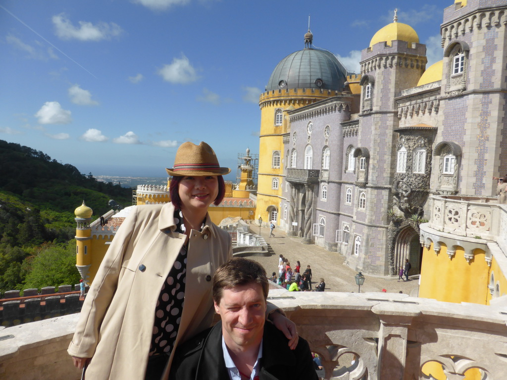 Tim and Miaomiao at the Queen`s Terrace, with a view on the southeast side of the Palácio da Pena palace and surroundings