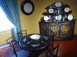 Table, chairs and closet in a room at the upper floor of the Palácio da Pena palace