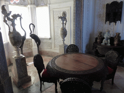 Table, chairs and vases in a room at the upper floor of the Palácio da Pena palace