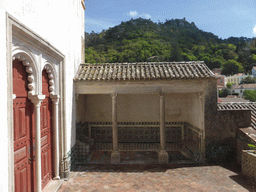 Veranda and the Castelo dos Mouros castle and surroundings, viewed from the Magpie Hall at the Palácio Nacional de Sintra palace