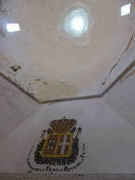 Coat of arms and the interior of the Kitchen Tower at the Kitchen at the Palácio Nacional de Sintra palace