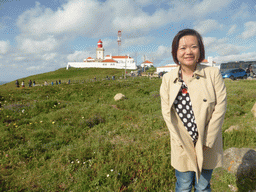 Miaomiao with the lighthouse at the Cabo da Roca cape