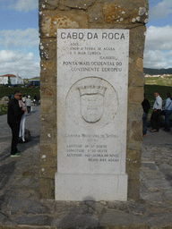 Plaque with inscription `Westernmost Point of Continental Europe` at the column with cross at the Cabo da Roca cape