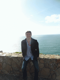 Tim at the wall at the Cabo da Roca cape and the Atlantic Ocean