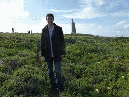 Tim at the right side of the column with cross at the Cabo da Roca cape