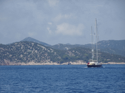 Boat on the Adriatic Sea and hills at the northwest side of Dubrovnik, viewed from the Elaphiti Islands tour boat