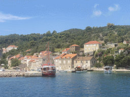 Boats at the Sudurad Harbour and the town of Sudurad, viewed from the Elaphiti Islands tour boat