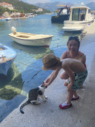 Miaomiao and Max with a cat at the Sudurad Harbour