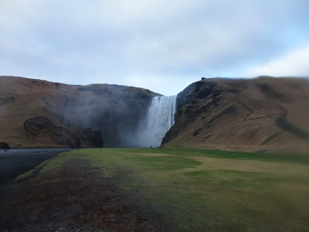 The Skógafoss waterfall, with trail and platform