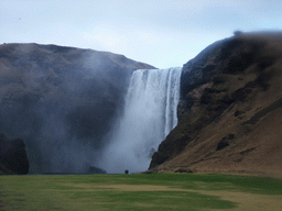 The Skógafoss waterfall, with trail and platform
