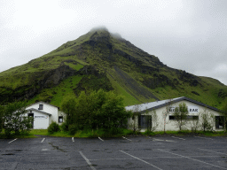 Mountain on the west side of Skógar and Hotel Skógafoss, viewed from the parking lot of the Fossbúð restaurant