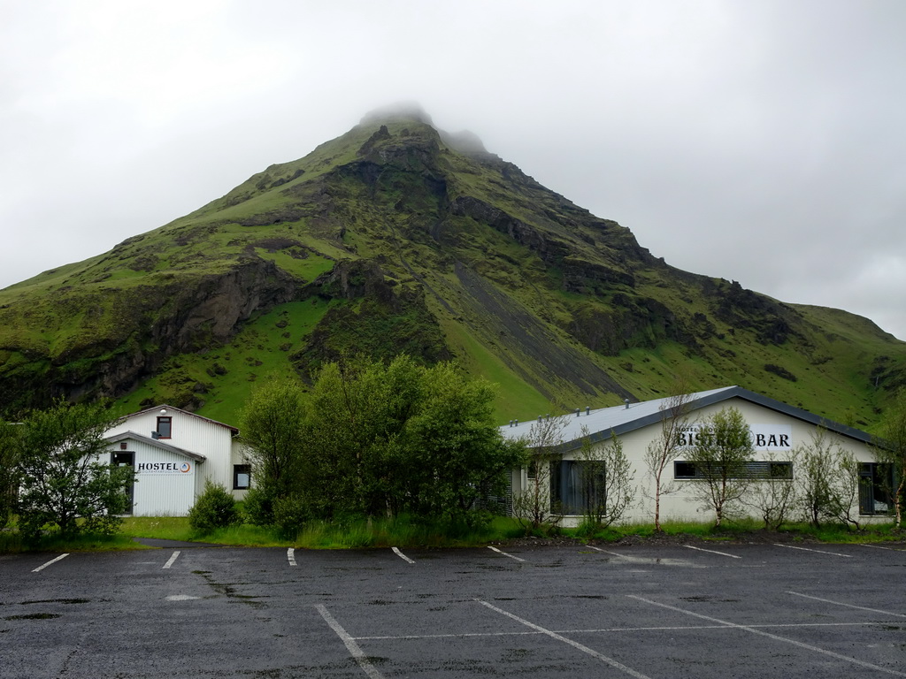 Mountain on the west side of Skógar and Hotel Skógafoss, viewed from the parking lot of the Fossbúð restaurant