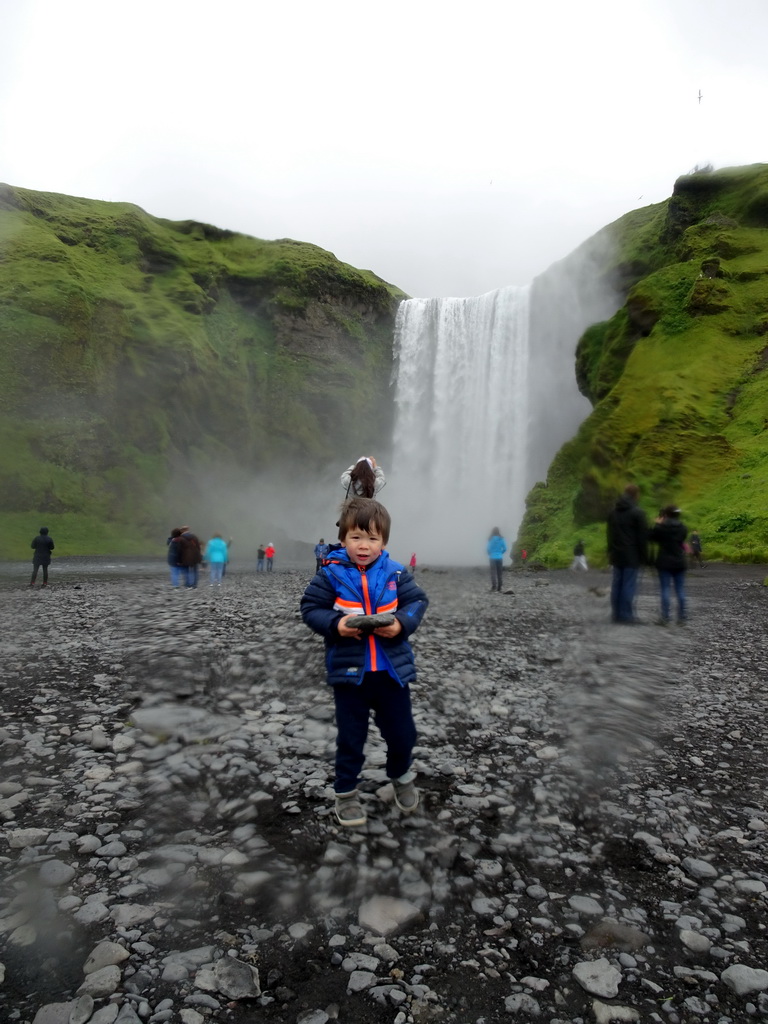 Max in front of the Skógafoss waterfall