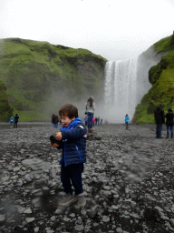 Max in front of the Skógafoss waterfall
