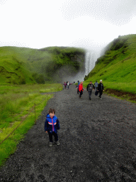 Max in front of the Skógafoss waterfall