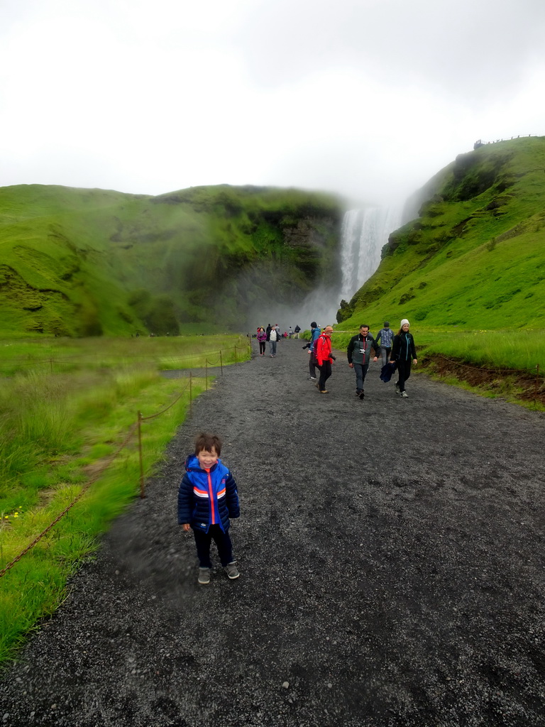 Max in front of the Skógafoss waterfall