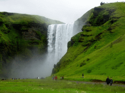 The Skógafoss waterfall and the platform on the east side, viewed from the parking lot