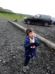 Max at the parking lot of the Skógafoss waterfall