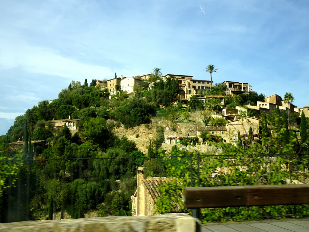 The southwest side of the town of Deià, viewed from the rental car on the Ma-10 road