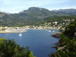 Boats in the harbour, viewed from the rental car on the Camí del Far street