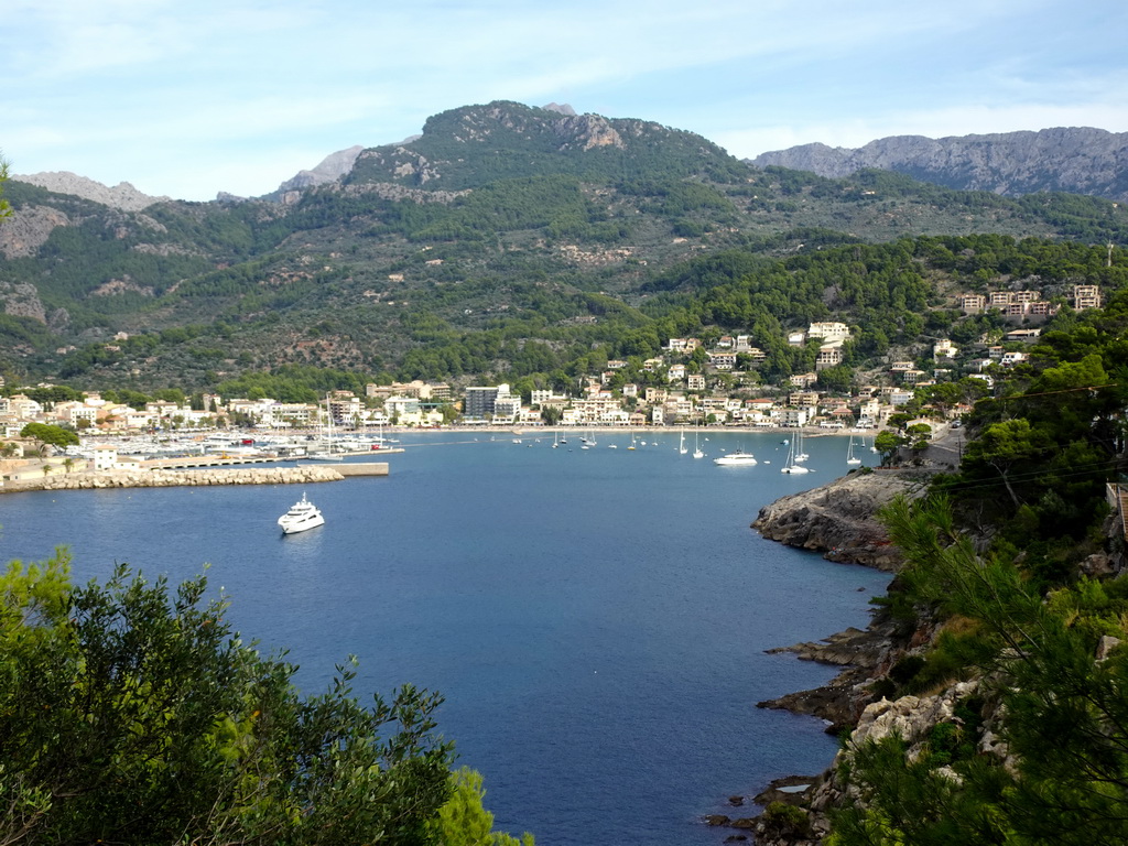 Boats in the harbour, viewed from the rental car on the Camí del Far street