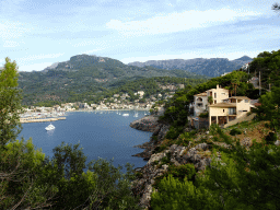 Boats in the harbour, viewed from the rental car on the Camí del Far street