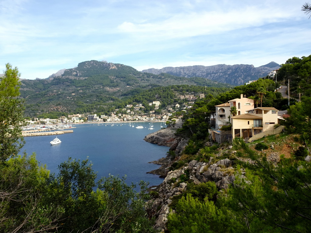 Boats in the harbour, viewed from the rental car on the Camí del Far street