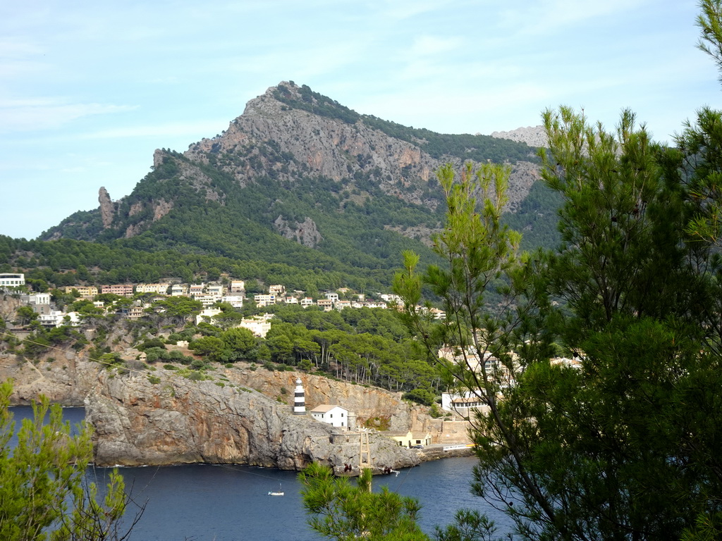 The Faro de Punta de Sa Creu lighthouse, viewed from the rental car on the Camí del Far street