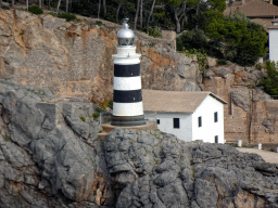 The Faro de Punta de Sa Creu lighthouse, viewed from the northern end of the Calle Poligono street
