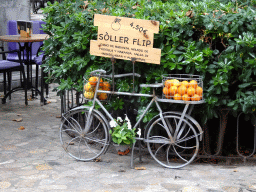 Bicycle with oranges at the Plaça Constitucio square