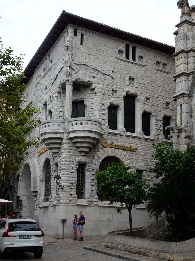 Northwest side of the Banco Santander building at the Plaça Constitucio square