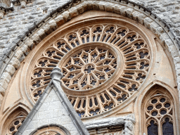 Rose window at the facade of the Església de Sant Bartomeu church at the Plaça Constitucio square