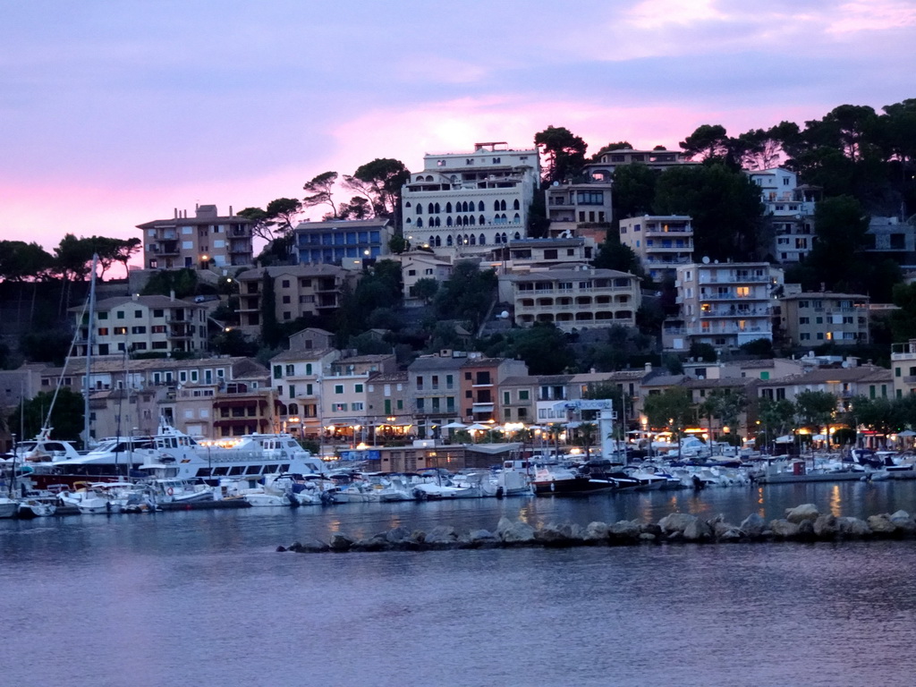 Boats and houses at the northeast side of the harbour, viewed from the Polígon de Través street, at sunset
