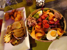 Salad, bread and chicken nuggets at the Restaurant Ses Oliveres