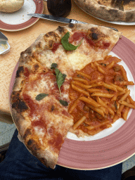 Pizza and pasta at the terrace of the Fauno Bar at the Piazza Torquato Tasso square