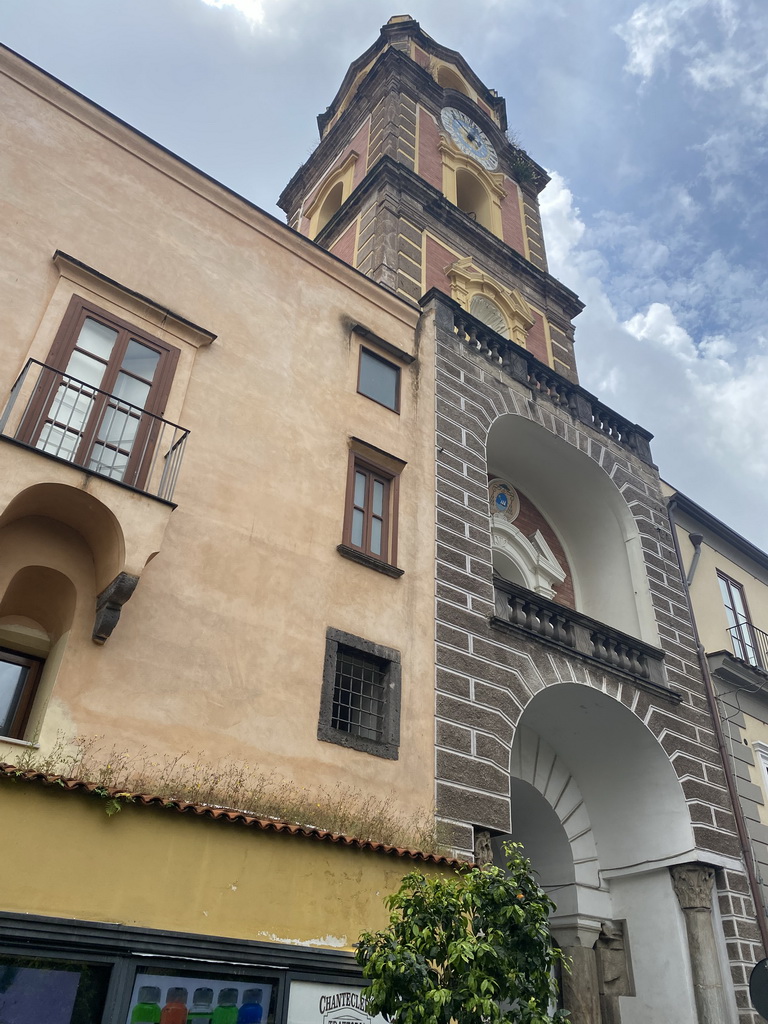 Front of the Torre dell`Orologio tower at the Corso Italia street