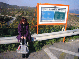 Miaomiao at the bus stop of Cape Sounion