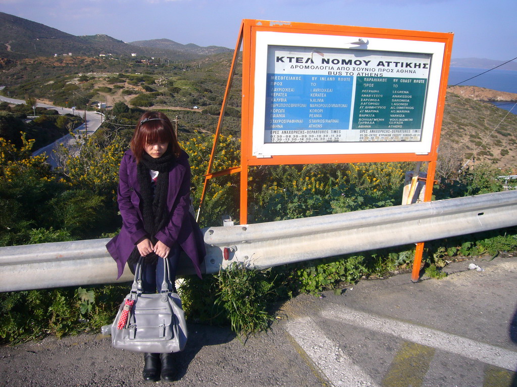 Miaomiao at the bus stop of Cape Sounion