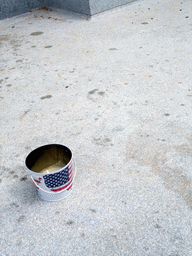 Bucket on the floor in front of the Stanford Mausoleum at Stanford University