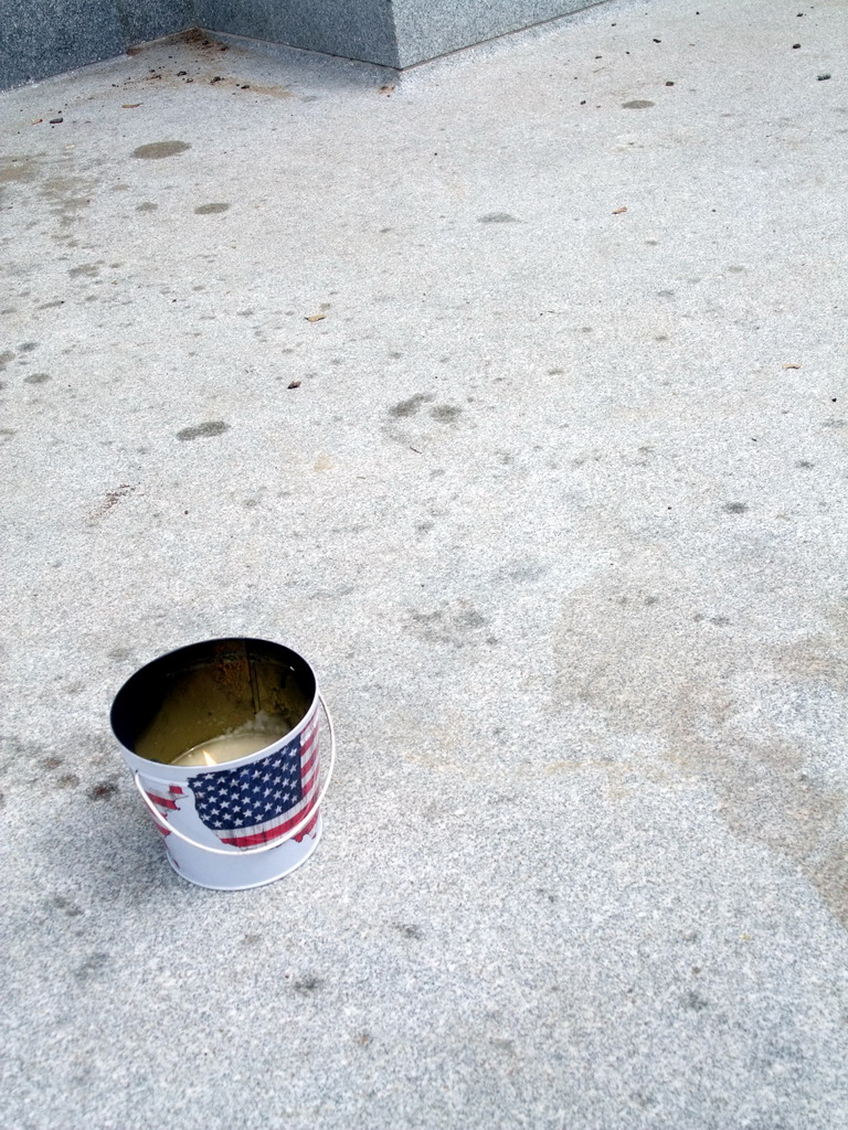 Bucket on the floor in front of the Stanford Mausoleum at Stanford University