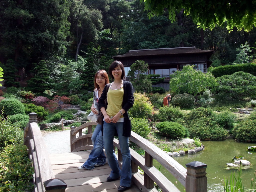 Miaomiao and Mengjin on a bridge in a park near Stanford