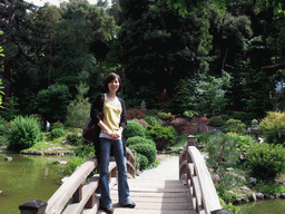 Mengjin on a bridge in a park near Stanford
