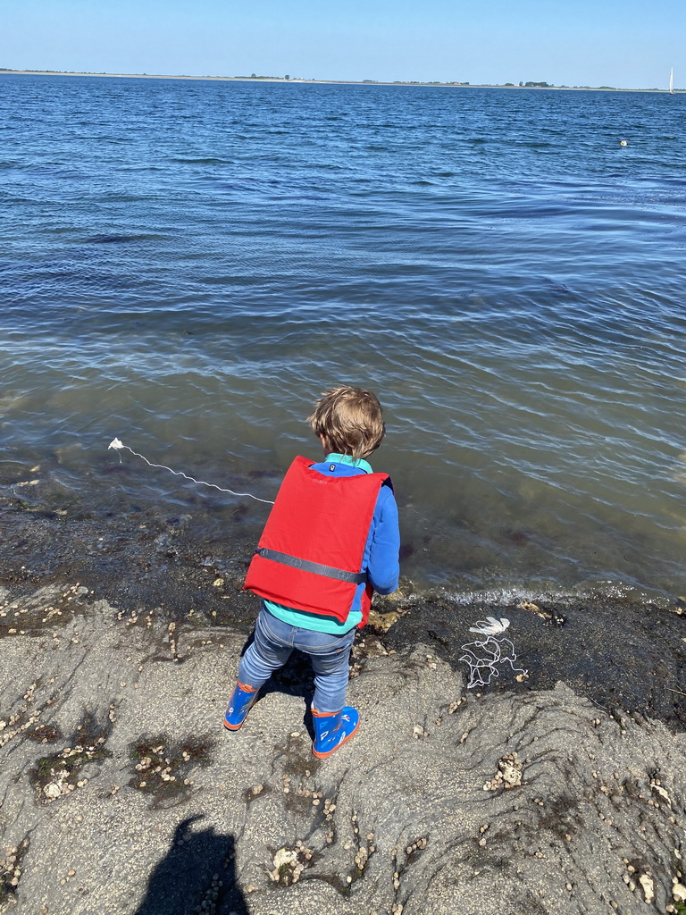 Max`s friend catching crabs on the beach near the Steiger Stavenisse pier