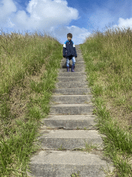 Max at the staircase to the beach near the Dijkweg road