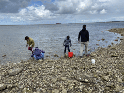 Miaomiao and our friends catching seashells at the beach near the Dijkweg road