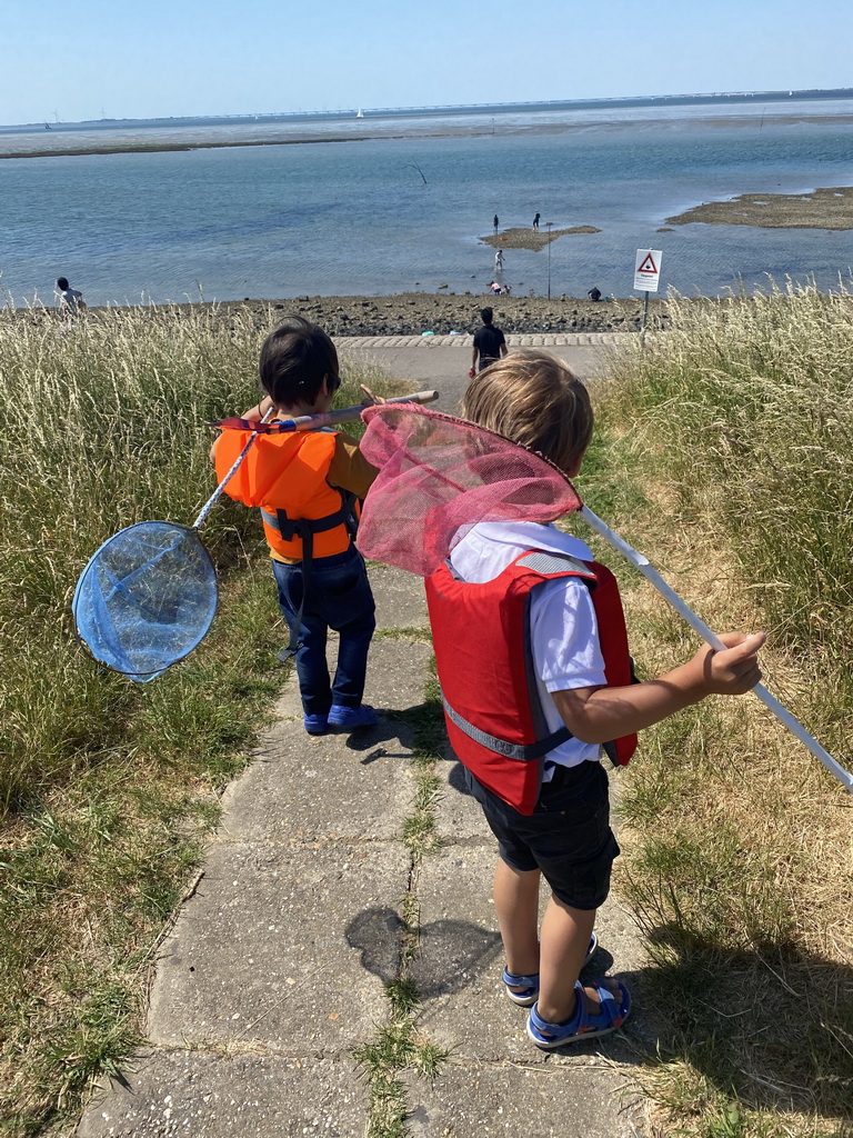 Max and his friend at the staircase to the beach near the Dijkweg road